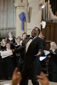 Members of the Santa Barbara Choral Society singing during the Red, White, and Blues concert at Trinity Episcopal Church on February 25, 2024 featuring Micael Conner 