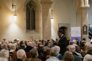 Members of the Santa Barbara Choral Society singing during the Red, White, and Blues concert at Trinity Episcopal Church on February 25, 2024 featuring Micael Conner reading from his book